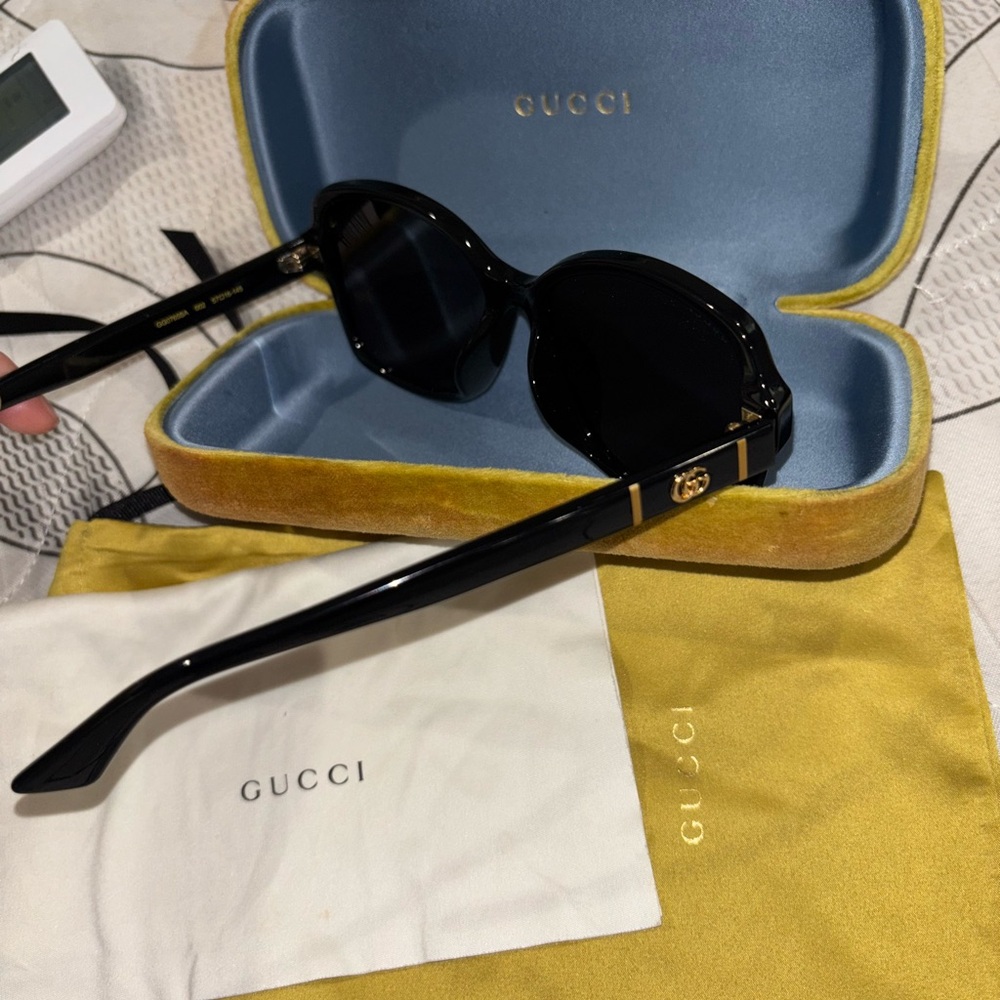 Gucci Black and Gold Sunglasses
